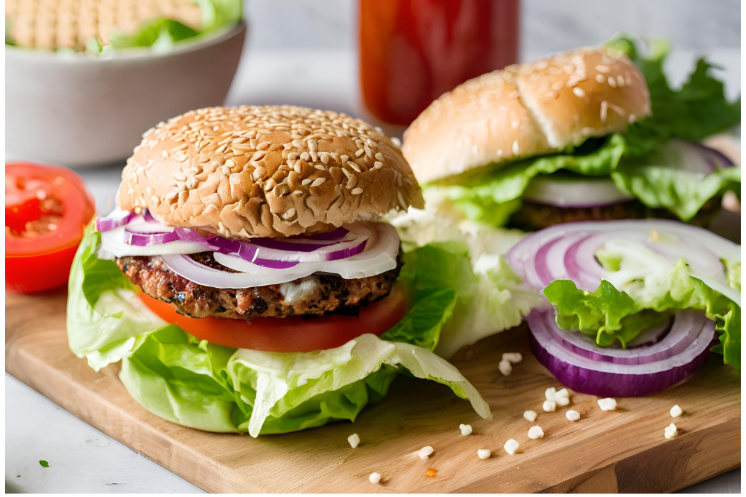 14 - Layers of fresh lettuce, tomato, and onions added